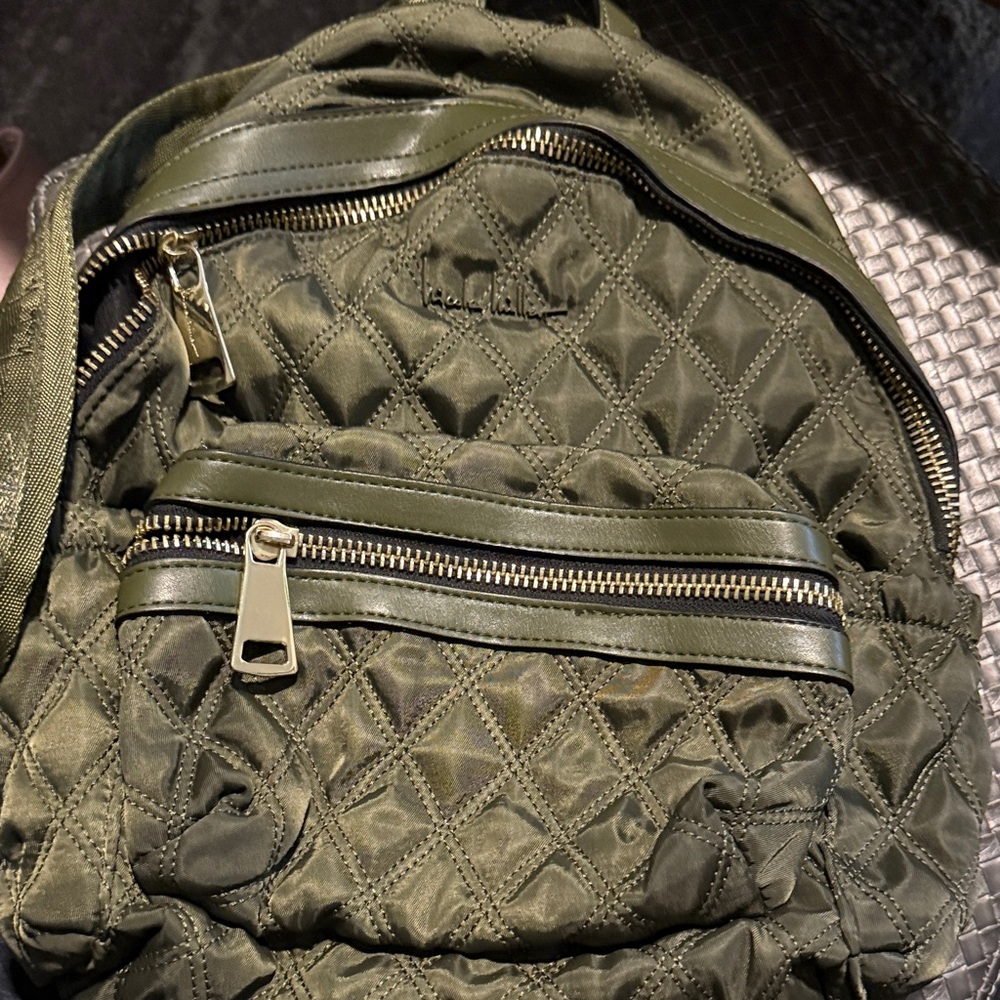 Nicole Miller green with gold accent medium size quilted backpack purse